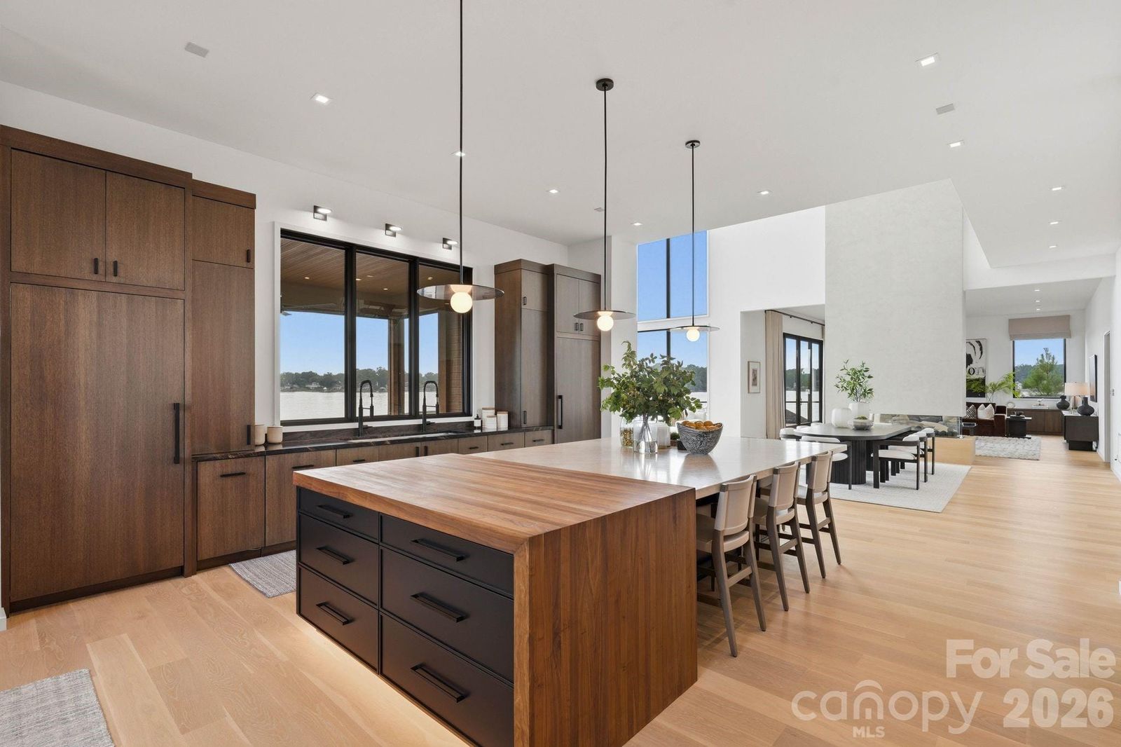 Kitchen at 123 Cove Point with a walnut-topped island, dark wood cabinetry, and lake views